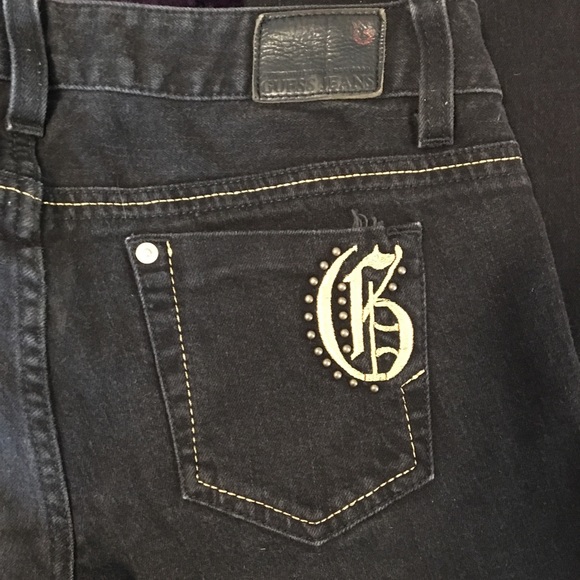 black jeans with gold stitching